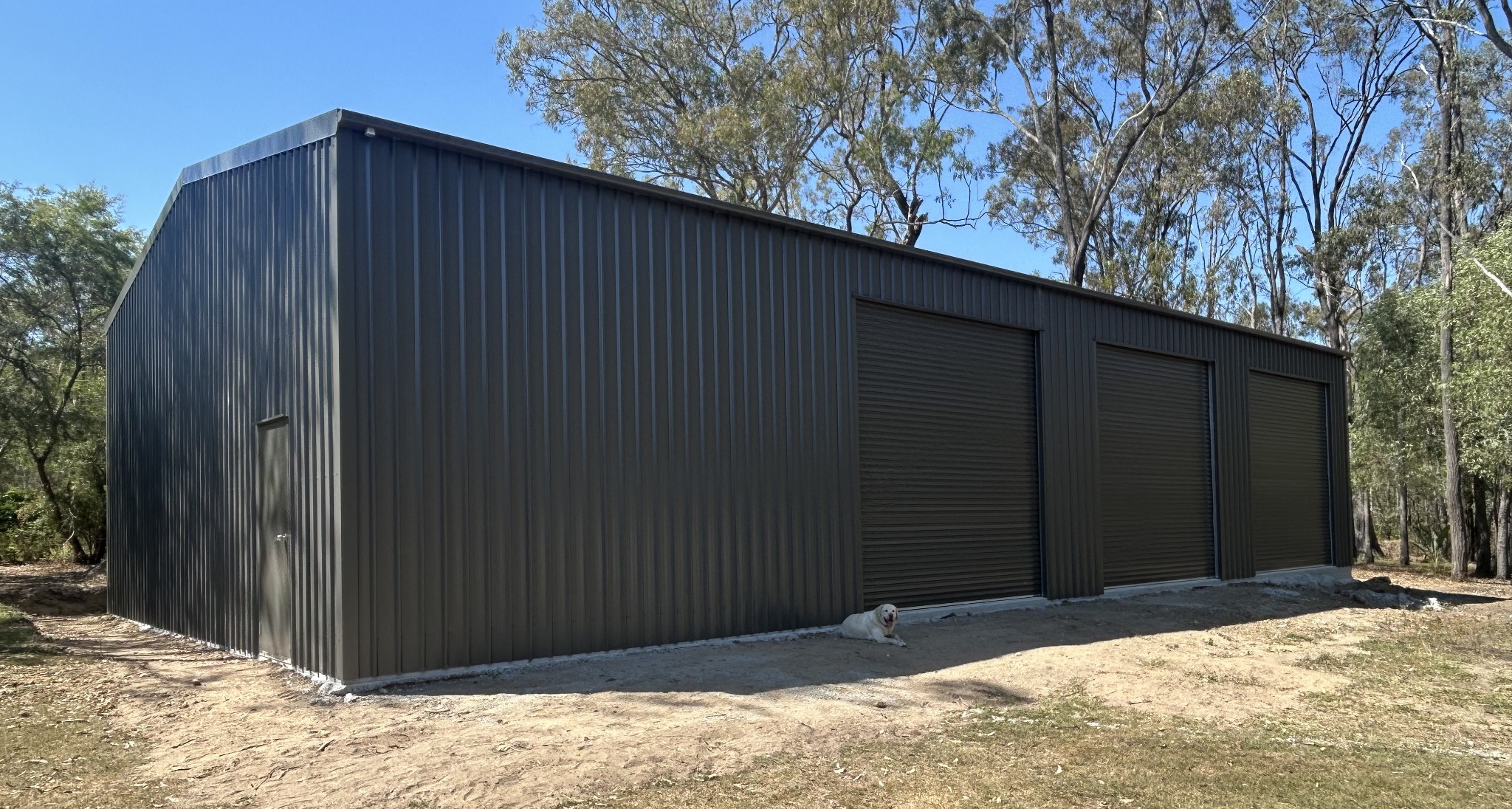 Three-bay charcoal steel workshop